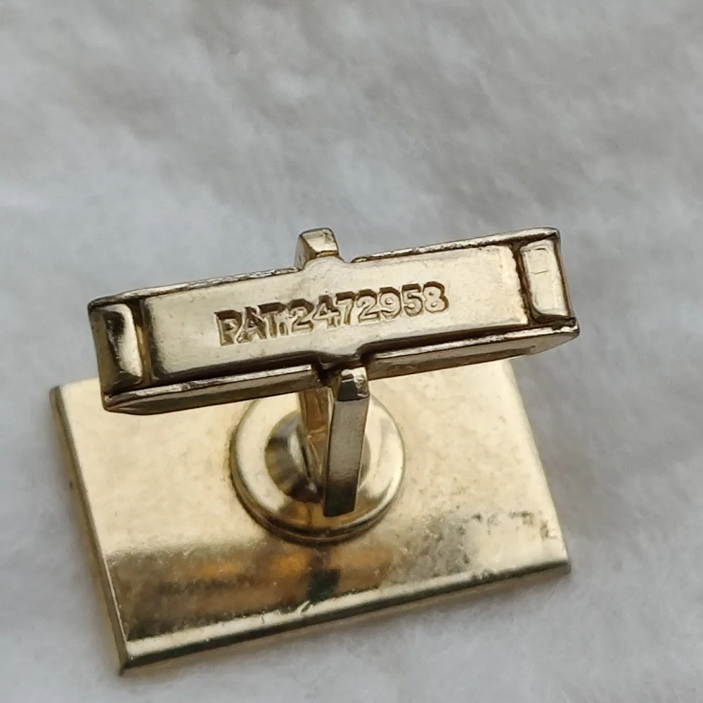 Vintage patented enameled crest cuff links